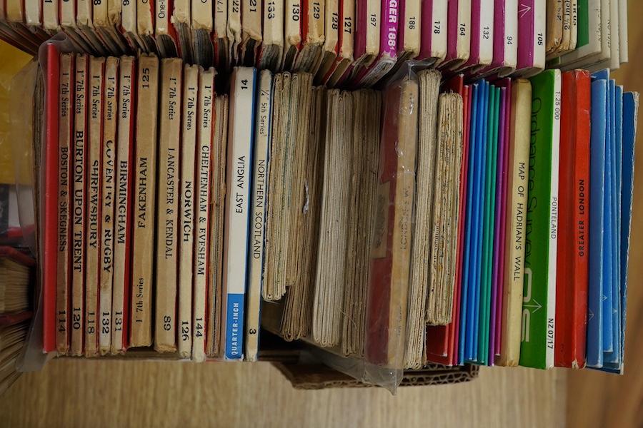 A collection of Ordnance Survey maps, including some early examples laid on canvas, a few ordinance survey related books and guides, an engraved Roman map of Britain dated 1821, and a few other maps. Condition - fair to